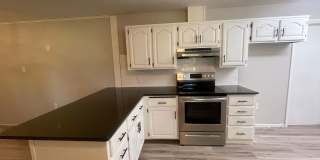 Beautiful 4 bedroom home completely remodeled in great location and school district! Gallery 11