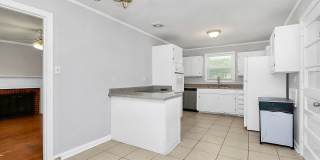 Discover the charm of this brick ranch nestled in the heart of Madison Park Gallery 15