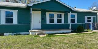 4-Bed, 2-Bath Beauty with Tile Showers & Fenced Yard! Gallery 1