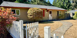 Charming Mid-Century Rambler: Original Hardwoods & Fenced Yard – Close to Light Rail! Gallery 1