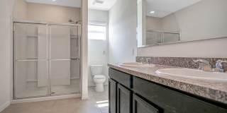 DISCOUNT OFFER! Spacious 3-Bdrm Townhome with 2-Car Garage in Gated Community Gallery 1