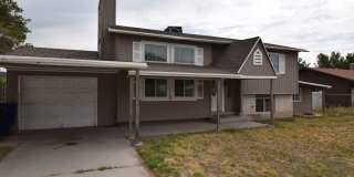 Comfortable Kearns 4-Bed Home with Spacious layout  Private Yard Gallery 1