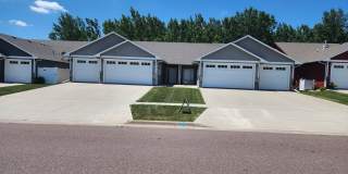 Three bedroom two bathroom Twin home w/ triple garage Three bedroom two bathroom Twin home w/ triple garage Gallery 1