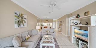 first-floor unit featuring a 2 bedroom, 2 bath fully furnished Gallery 10