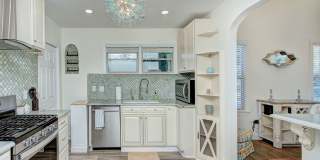 Discover the charm of this top-floor unit in a beautifully updated single-family bungalow Gallery 11