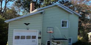 Charming 2-Bedroom Single-Family Home with Garage and Off-Street Parking Gallery 1