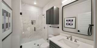 Discover modern elegance in the newly constructed Edgewater Condominiums, a boutique community featuring 18 luxurious units with 9 still available for purchase. Gallery 24