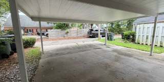 COZY 2/2 SE Townhome with Plank Floors, W/D, Stainless Steel Appliances, Carport, & W/D! Avail NOW for $1495 Gallery 31