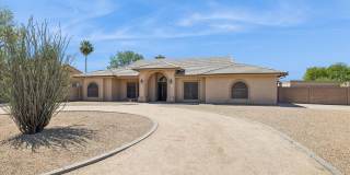 Furnished Basement home ready for move in NOW!!!  Corner lot, No HOA, lots of parking!!!  RV gates!!!  Luxurious backyard with pool and is your own Oasis in the City just out of the City!!!  Close to Lake Pleasant!!! Gallery 1