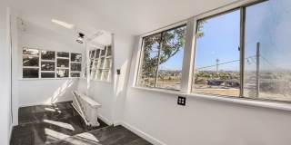 Unique 2BR Downtown Brick Rental – Bonus Space + Backyard Gallery 16
