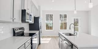 This home presents a harmonious blend of elegance, flexibility, and modern convenience within a welcoming community setting. Gallery 15