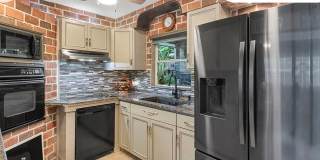 Charming 3-bedroom, 2-bath pool home available for move-in at the end of June. Gallery 5
