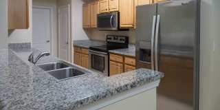 Beautiful 3 Bedroom, 2 Bath with Volume ceilings and Private Garage! Gallery 1