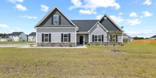 Like-New 4BR Home in Stateside with Pool Access & Side-Load Garage Gallery 1