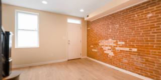 Spacious 2BR/2.5BA Townhome with Finished Basement & Extra Storage Gallery 11