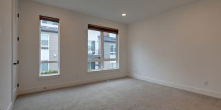 Live Where Style Meets Convenience – 2BR Townhome + Garage Gallery 12