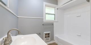 COMPLETE UPDATE! 4 bed, 2 bath, 1 car garage! Gallery 24