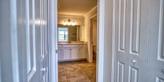 Annual Unfurnished Rental – Coach Home 3 Bedrooms, 2 Baths, 2 Car Garage, with Resort Like Amenities – Gran Paradiso Community! Gallery 1