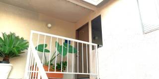 2-Bedroom, 2-Bath Upstairs Condo Unit in Gated Pomona Community, Water/Trash/HOA Included! Gallery 3