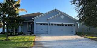 5827 Tarleton Way #2, This great 4/3/3 SFH has a Split bedroom plan with a private master. Gallery 1
