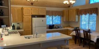 Location! Location! Terrific Four bedroom Three Bath Home with Two Car Garage including Lake Rights! Gallery 7