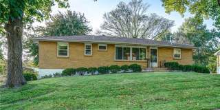 Coming Soon - Charming 3-Bedroom Home with Fenced Yard & Spacious Deck in Kansas City Gallery 1