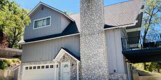 Location! Location! Terrific Four bedroom Three Bath Home with Two Car Garage including Lake Rights! Gallery 1