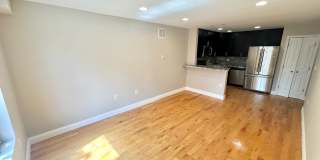 Spacious 3-Bedroom, 2-Bath Apartment with Finished Basement, Private Patio, and In-Unit Laundry Spacious 3-Bedroom, 2-Bath Apartment with Finished Basement, Private Patio, and In-Unit Laundry Gallery 1