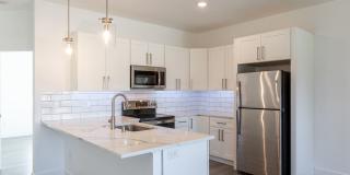 Brand New 4 plex with over 1300+ Square Feet. 2 Bedrooms, 2 Baths with attached garage and located in Cul-de-sac. Gallery 13
