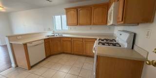 THIS 1,596 SQ. FT. HOME HAS 3 BEDROOMS, 2.5 BATHROOMS, A 2 CAR GARAGE LOCATED ON A CORNER LOT AND NEW WOOD FLOORING Gallery 19