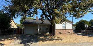 Charming 3-Bedroom Home with Spacious Backyard Gallery 1