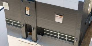 Discover modern elegance in the newly constructed Edgewater Condominiums, a boutique community featuring 18 luxurious units with 9 still available for purchase. Gallery 34