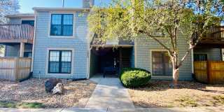 {12030 - F}  Updated Condo in Fantastic Location + Top Floor + Covered Parking Included + Private Patio + Community Pool and Clubhouse Gallery 1