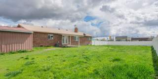 Spacious 3 Bed 2 Bath Brick Home with RV Parking, Shop Space & Large Yard in Tremonton! Gallery 42