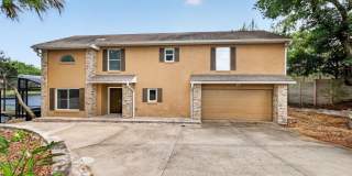 Available Now! Waterfront Living at Its Best – Pool, Decks & Gated Privacy Gallery 1