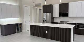 Brand-New Waterfront Luxury in Cape Coral | Heated Pool, Spa, Outdoor Kitchen & 3-Car Garage Gallery 10