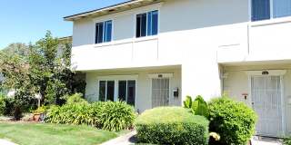 Spacious 2-Story Townhome, Fresh Paint, New Carpet, Wood Floor Downstairs, Patio, Dual Pane, Washer/Dryer Hookups! Gallery 1