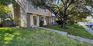 Welcome to this chic 3 bedroom end of group townhome in Queen Anne Village. Gallery 1