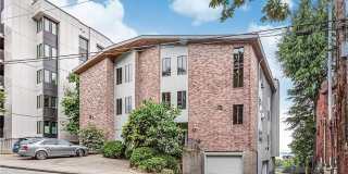 1,300+ Sq Ft 2BR Condo w/ Parking, W/D  Utilities Included | $1,000 Move-In Credit Gallery 1