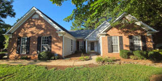 Spacious 4 Bedroom/2 Bath Ranch Home on Corner Lot in Wyndham Shores - 2 Car Garage - Fireplace - 2 Community Pools - Community Boat Launch Gallery 1
