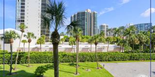 **PARK SHORE BEAUTY WALK TO VENETIAN VILLAGE ** ESPLANADE** NICE AMENITIES ** 2 BEDROOM CONDO ON THE BEACH ** Gallery 59