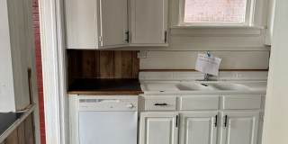 Single Family Home 3 bedroom 1 bath new paint flooring with basement fenced in yard Gallery 8