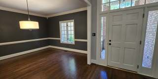 Custom Brick Home on Private Wooded Lot in Cary's Prestigious Wessex Community Gallery 4