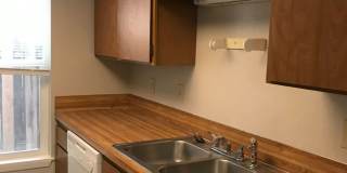 Updated 2 BR / 1.5 BA End Unit – Private Yard & Fresh Interior! Gallery 1