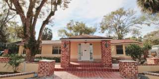 Stunning 3-Bed, 2-Bath Spanish-Inspired Custom Home with Elegant Gardens & Fountains Gallery 1