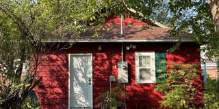 Charming Furnished 1BR Home with Garage & Yard – Country Feel in the City Charming Furnished 1BR Home with Garage & Yard – Country Feel in the City Gallery 1