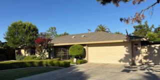 Stockdale Country Club 3 Bedroom Home with Paid Solar, Sunroom, RV Parking, and Ample Storage Gallery 1