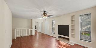 Spacious 2BR/2BA Corner Unit with Finished Basement, Private Patio & Garage Gallery 3