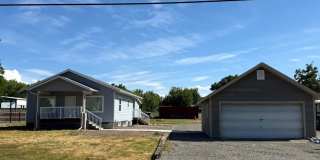 Spacious 4-Bedroom Home with Detached Garage & Large Yard in Clarkston Gallery 1