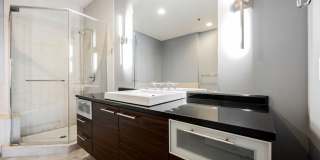 Modern Industrial Loft at Soho Lofts – 1BR/2BA High-Rise in the Arts District, City & Mountain Views! Gallery 32